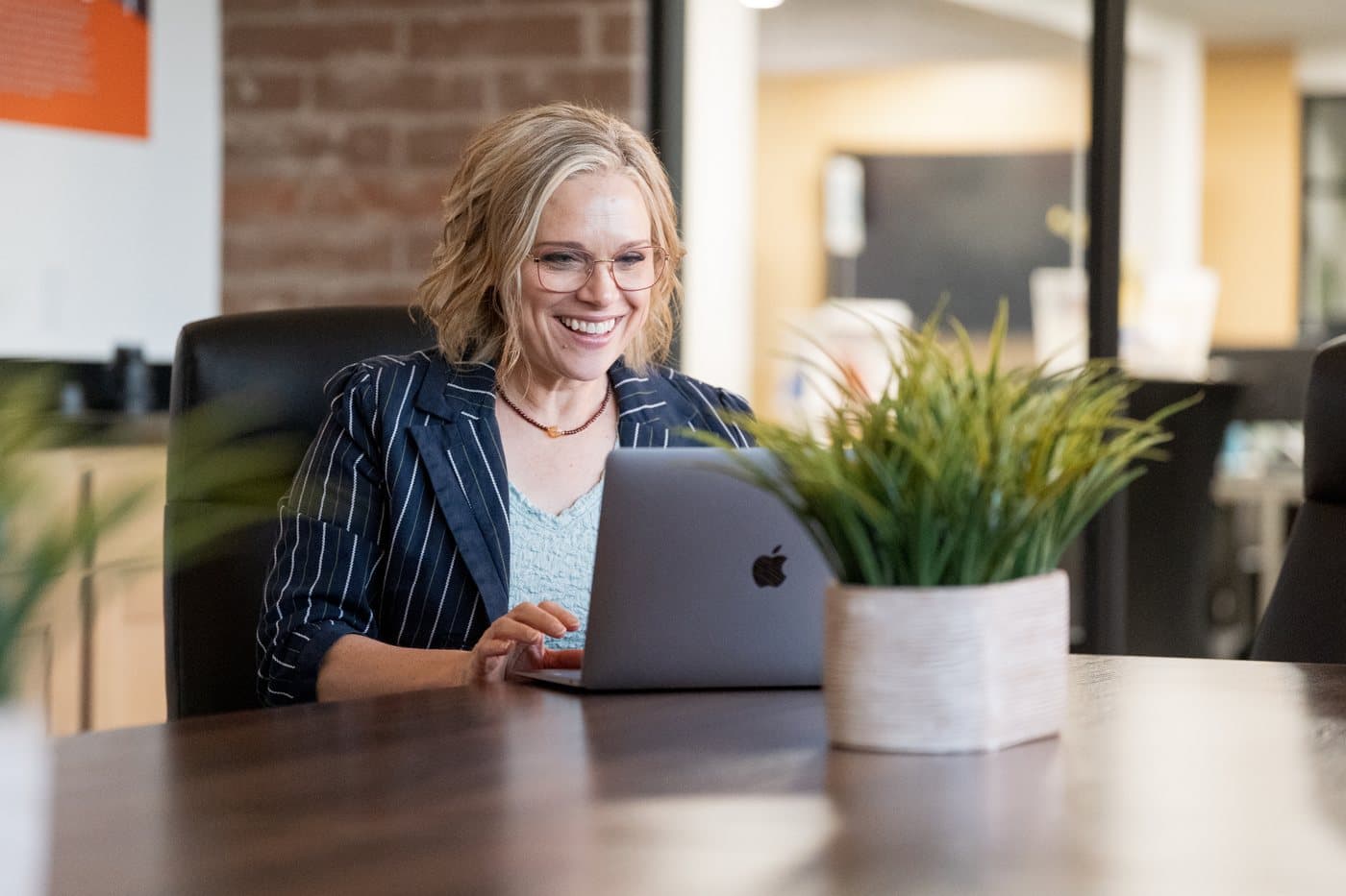 Janna Hubert working with a small business